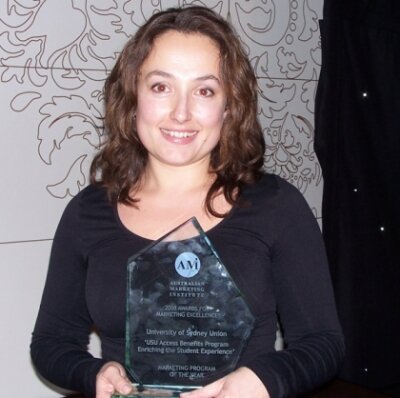 USU Marketing Manager, Claudia Crosariol with the award